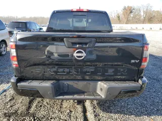 2023 Nissan Frontier SV with VIN 1N6ED1EJ1PN604832, listed as a Copart auction lot 49678865 with 33,869 mi miles and Salvage Title. Bid and sale history available at carsss.com. Image 6.