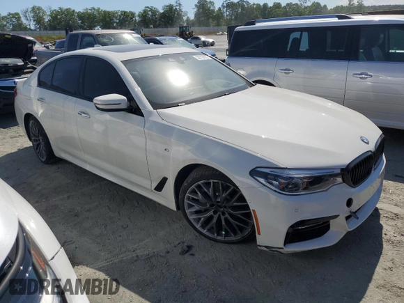 2018 BMW 5 Series 540i xDrive with VIN WBAJE7C52JG891212, listed as a Copart auction lot 58119195 with 73,770 mi miles and Salvage title. Bid and sale history available at DreamBid. Image 4.