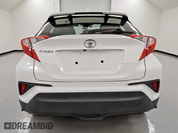 2021 Toyota C-HR LE z VIN NMTKHMBX0MR120577, wystawiony jako Copart lot #57019105 z przebiegiem 152 488 mil mil oraz Czysty tytuł • Clean title. Historia ofert i sprzedaży dostępna na DreamBid. Obrazek 6.
