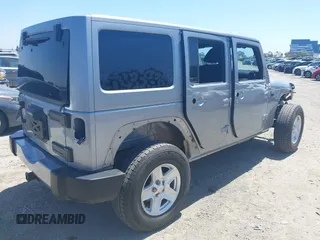 2018 Jeep Wrangler Unlimited Sport S with VIN 1C4HJWDG5JL839703, listed as a IAAI auction lot 42140205 with 61,604 mi miles and . Bid and sale history available at DreamBid. Image 4.