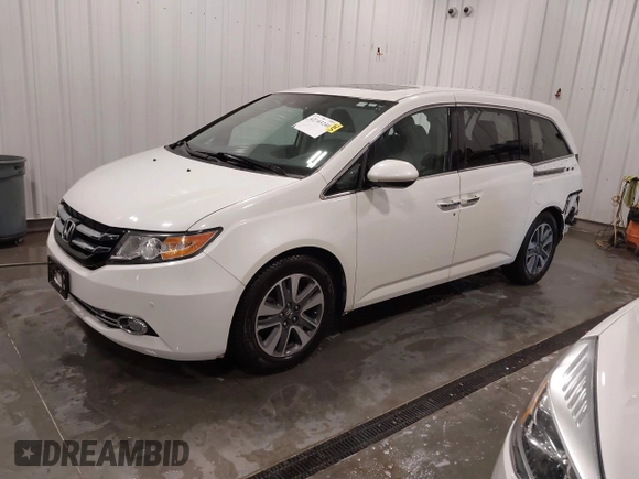 2015 Honda Odyssey Touring Elite with VIN 5FNRL5H92FB020159, listed as a IAAI auction lot 42103240 with 79,322 mi miles and . Bid and sale history available at DreamBid. Image 22.