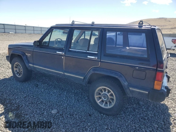 1987 Jeep Cherokee with VIN 1JCMT7842HT114597, listed as a Copart auction lot 49319945 with 230,675 mi miles and Clean title. Bid and sale history available at DreamBid. Image 2.