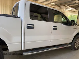 2014 Ford F-150 XL with VIN 1FTFW1EF9EKF91498, listed as a IAAI auction lot 42143154 with 139,151 mi miles. Bid and sale history available at carsss.com. Image 1.