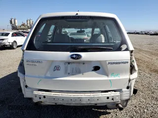2010 Subaru Forester X with VIN JF2SH6AC0AH743775, listed as a Copart auction lot 60884835 with 127,481 mi miles and Salvage title. Bid and sale history available at DreamBid. Image 6.