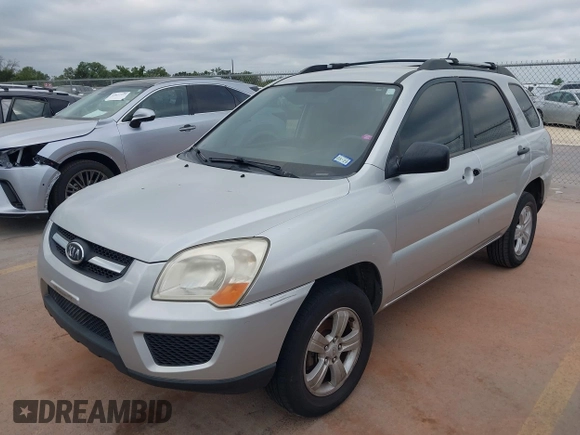 2009 Kia Sportage LX with VIN KNDJF724097567390, listed as a IAAI auction lot 42066762 with 159,946 mi miles. Bid and sale history available at carsss.com. Image 2.