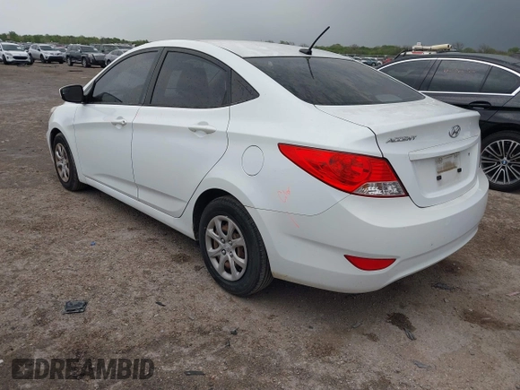 2014 Hyundai Accent GLS with VIN KMHCT4AE5EU649178, listed as a IAAI auction lot 41936729 with 102,737 mi miles. Bid and sale history available at carsss.com. Image 3.