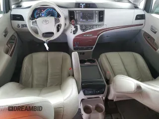 2012 Toyota Sienna XLE AAS with VIN 5TDYK3DC7CS275496, listed as a Copart auction lot 62612815 with 130,027 mi miles and Salvage title. Bid and sale history available at DreamBid. Image 8.