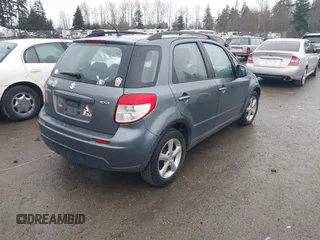 2008 Suzuki SX4 Regional Edition Touring with VIN JS2YA413285102839, listed as a IAAI auction lot 41473669 with 102,914 mi miles. Bid and sale history available at carsss.com. Image 4.