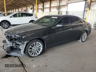 2014 Cadillac CTS Premium AWD z VIN 1G6AZ5S39E0179664, wystawiony jako Copart lot #58439985 z przebiegiem 109 085 mil mil oraz Szkoda całkowita • Salvage title. Historia ofert i sprzedaży dostępna na DreamBid. Obrazek 1.