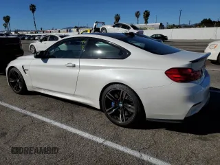 2015 BMW M4 with VIN WBS3R9C55FK330561, listed as a Copart auction lot 40490133 with 65,127 mi miles. Bid and sale history available at carsss.com. Image 2.