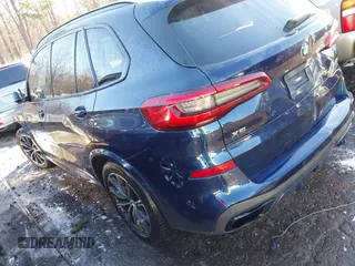 2020 BMW X5 M50i with VIN 5UXJU4C03LL227857, listed as a IAAI auction lot 41351112 with 65,325 mi miles and . Bid and sale history available at DreamBid. Image 3.