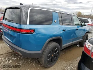 2024 Rivian R1S Adventure with VIN 7PDSGCBA7RN037664, listed as a Copart auction lot 49236015 with 16,496 mi miles and Salvage Title. Bid and sale history available at carsss.com. Image 3.
