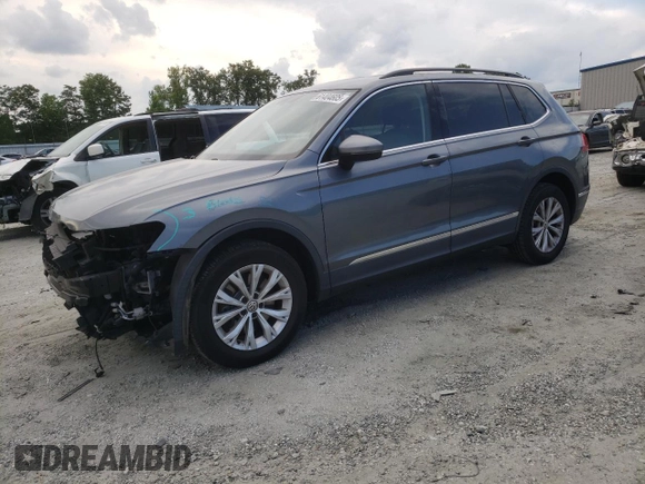 2018 Volkswagen Tiguan SEL with VIN 3VV3B7AX5JM125247, listed as a Copart auction lot 61404605 with 96,748 mi miles and Salvage title. Bid and sale history available at DreamBid. Image 1.