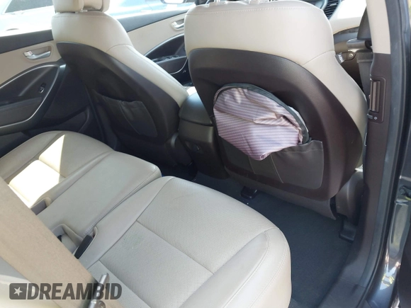 2017 Hyundai Santa Fe 2.4L z VIN 5XYZU3LB4HG462058, wystawiony jako IAAI lot #41861190 z przebiegiem 87 102 mil mil oraz . Historia ofert i sprzedaży dostępna na DreamBid. Obrazek 8.