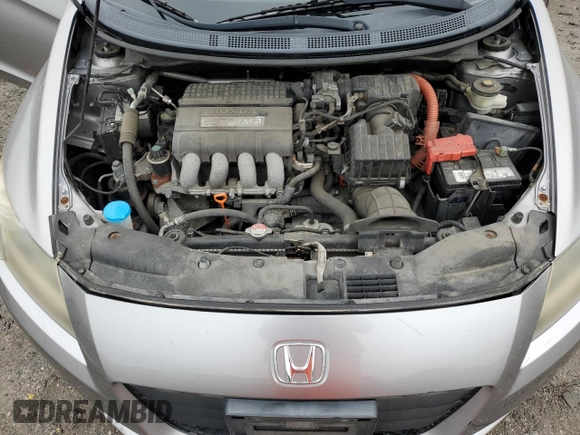 2011 Honda CR-Z EX z VIN JHMZF1D69BS002944, wystawiony jako Copart lot #57101765 z przebiegiem 125 001 mil mil oraz Szkoda całkowita • Salvage title. Historia ofert i sprzedaży dostępna na DreamBid. Obrazek 11.