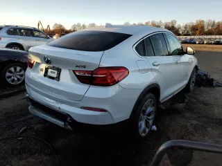 2015 BMW X4 xDrive28i with VIN 5UXXW3C58F0M88241, listed as a Copart auction lot 66591742 with 95,658 mi miles. Bid and sale history available at carsss.com. Image 4.