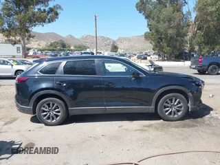 2020 Mazda CX-9 Sport with VIN JM3TCABY8L0407430, listed as a IAAI auction lot 42288490 with 50,317 mi miles and . Bid and sale history available at DreamBid. Image 13.