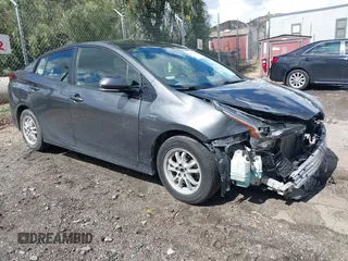2020 Toyota Prius L Eco with VIN JTDKARFU8L3114786, listed as a IAAI auction lot 41804909 with 196,099 mi miles and . Bid and sale history available at DreamBid. Image 1.