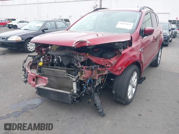 2018 Ford Escape SE z VIN 1FMCU9GD8JUB14803, wystawiony jako IAAI lot #41842056 z przebiegiem 50 712 mil mil oraz . Historia ofert i sprzedaży dostępna na DreamBid. Obrazek 6.
