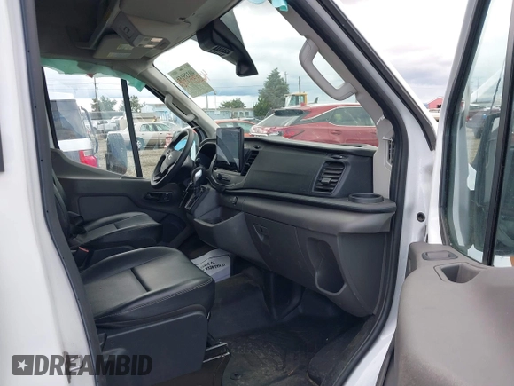 2022 Ford Transit Cargo with VIN 1FTBR1C83NKA78404, listed as a IAAI auction lot 40335158 with 31,273 mi miles and . Bid and sale history available at DreamBid. Image 5.