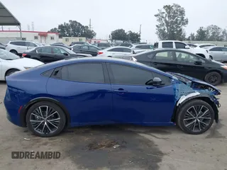 2023 Toyota Prius LE z VIN JTDACAAU8P3002445, wystawiony jako IAAI lot #42159749 z przebiegiem 18 510 mil mil oraz . Historia ofert i sprzedaży dostępna na DreamBid. Obrazek 14.