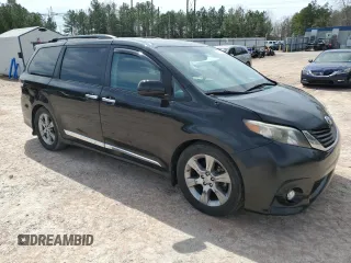 2014 Toyota Sienna SE with VIN 5TDXK3DC7ES440493, listed as a Copart auction lot 49778085 with 154,354 mi miles and Salvage Title. Bid and sale history available at DreamBid. Image 4.