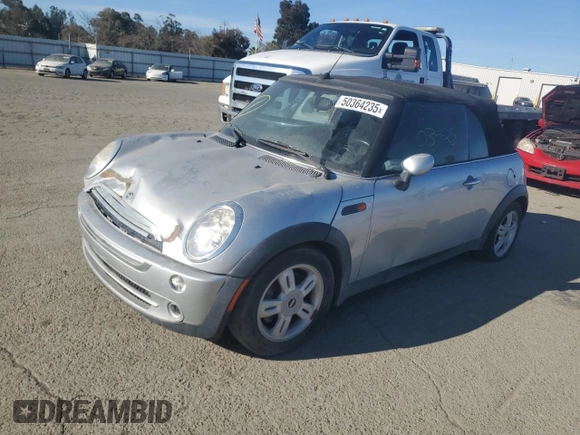 2005 MINI Convertible with VIN WMWRF33465TG10044, listed as a Copart auction lot 50364235 with 152,186 mi miles and Salvage title. Bid and sale history available at DreamBid. Image 1.