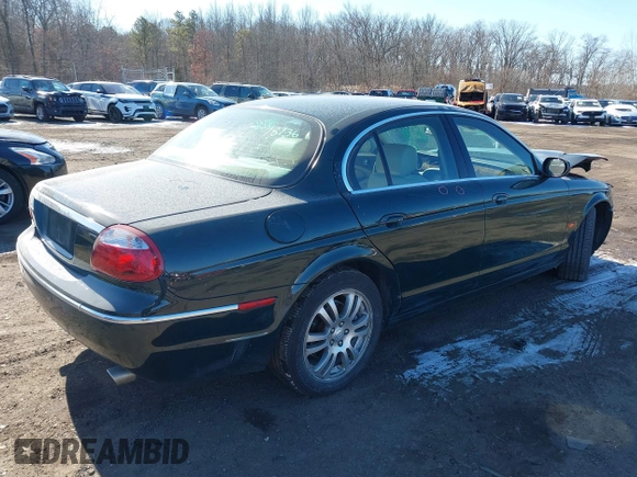 2005 Jaguar S-Type with VIN SAJWA01T95FN51551, listed as a IAAI auction lot 41637854 with 90,075 mi miles and . Bid and sale history available at DreamBid. Image 4.