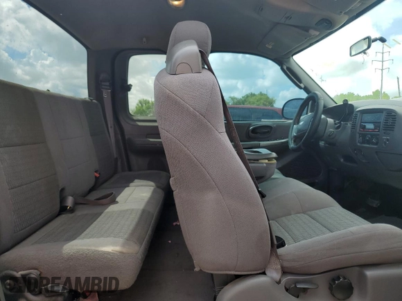 2003 Ford F-150 XL with VIN 2FTRX17WX3CB09775, listed as a Copart auction lot 56696415 with 226,460 mi miles and Salvage title. Bid and sale history available at DreamBid. Image 10.