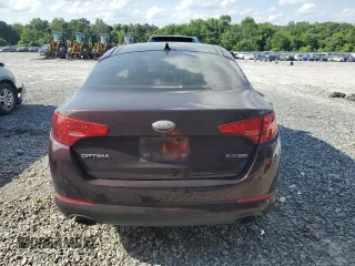 2013 Kia Optima EX z VIN 5XXGN4A77DG138576, wystawiony jako Copart lot #57203965 z przebiegiem 201 406 mil mil oraz Szkoda całkowita • Salvage title. Historia ofert i sprzedaży dostępna na DreamBid. Obrazek 6.
