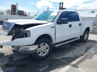 2004 Ford F-150 XLT with VIN 1FTPW14584FA24705, listed as a IAAI auction lot 41883212 with 172,251 mi miles. Bid and sale history available at carsss.com. Image 2.