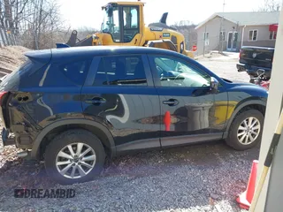 2014 Mazda CX-5 Touring with VIN JM3KE4CY8E0333029, listed as a IAAI auction lot 41857199 with 218,887 mi miles. Bid and sale history available at carsss.com. Image 13.