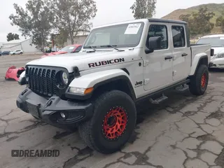 2021 Jeep Gladiator Willys with VIN 1C6HJTAG1ML572638, listed as a IAAI auction lot 42065562 with 43,040 mi miles and . Bid and sale history available at DreamBid. Image 2.