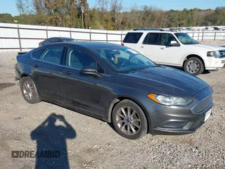 2017 Ford Fusion SE with VIN 3FA6P0H71HR369779, listed as a IAAI auction lot 40942962 with 123,956 mi miles and . Bid and sale history available at DreamBid. Image 1.