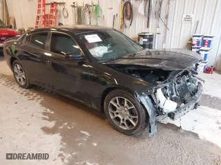 2015 Dodge Charger SXT with VIN 2C3CDXJGXFH754733, listed as a IAAI auction lot 41721035 with 1 mi miles. Bid and sale history available at carsss.com. Image 1.