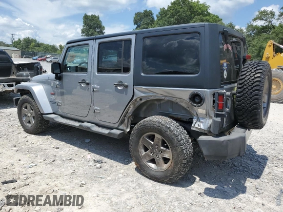 2013 Jeep Wrangler Unlimited Sport with VIN 1C4BJWDG4DL628518, listed as a Copart auction lot 65029795 with 142,852 mi miles and Salvage title. Bid and sale history available at DreamBid. Image 2.