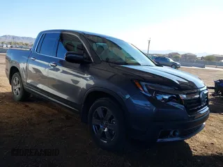 2020 Honda Ridgeline RTL-E with VIN 5FPYK3F70LB007207, listed as a IAAI auction lot 41612195 with 85,111 mi miles and . Bid and sale history available at DreamBid. Image 1.