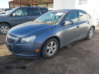 2014 Chevrolet Cruze 1LT с VIN 1G1PC5SB5E7461591, выставлен на аукционе IAAI как лот 41764302 с пробегом 129 924 миль миль и . История ставок и продаж доступна на DreamBid. Изображение 2.
