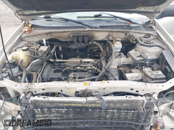 2005 Mercury Mariner Convenience z VIN 4M2YU57Z85DJ28652, wystawiony jako IAAI lot #41524903 z przebiegiem 228 497 mil mil oraz . Historia ofert i sprzedaży dostępna na DreamBid. Obrazek 10.