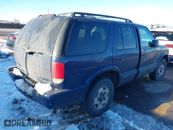 2002 Chevrolet Blazer LS z VIN 1GNDT13W82K183578, wystawiony jako IAAI lot #41349710 z przebiegiem Nie podano mil oraz . Historia ofert i sprzedaży dostępna na DreamBid. Obrazek 4.