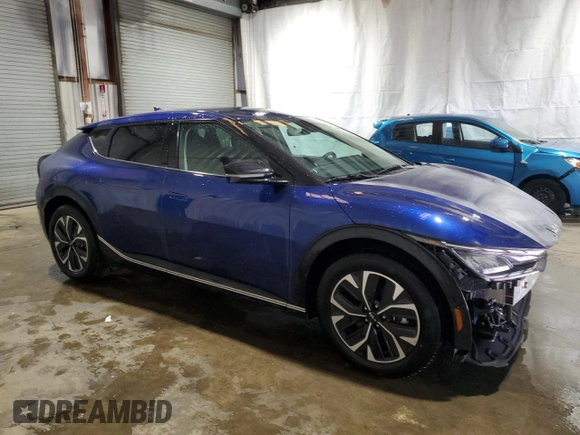 2024 Kia EV6 Wind with VIN KNDC34LA0R5617785, listed as a Copart auction lot 54454865 with 15,423 mi miles and Clean Title. Bid and sale history available at DreamBid. Image 4.