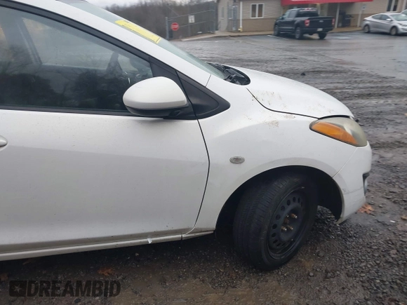 2012 Mazda 2 Touring z VIN JM1DE1LY4C0141202, wystawiony jako IAAI lot #41051663 z przebiegiem 160 364 mil mil oraz . Historia ofert i sprzedaży dostępna na DreamBid. Obrazek 17.