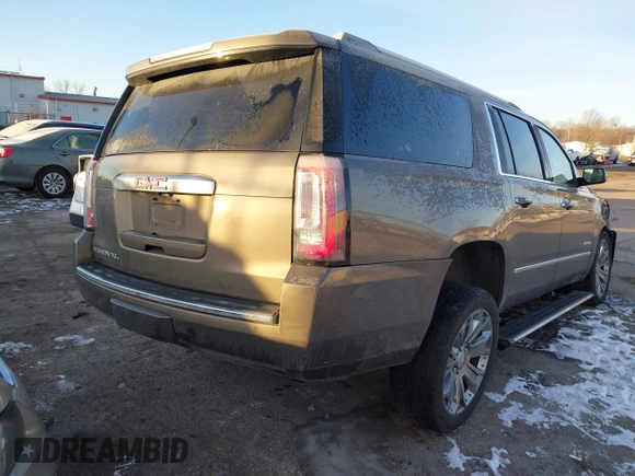 2016 GMC Yukon XL Denali with VIN 1GKS2HKJ8GR432174, listed as a IAAI auction lot 41411844 with 187,258 mi miles and . Bid and sale history available at carsss.com. Image 3.