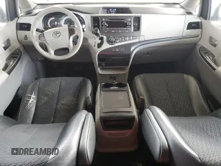 2012 Toyota Sienna SE with VIN 5TDXK3DC9CS215991, listed as a Copart auction lot 51868005 with 215,075 mi miles and Salvage title. Bid and sale history available at DreamBid. Image 8.