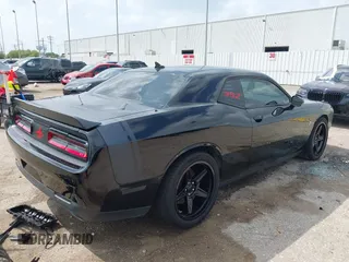 2016 Dodge Challenger R/T Scat Pack z VIN 2C3CDZFJ3GH334930, wystawiony jako IAAI lot #41872373 z przebiegiem 146 937 mil mil oraz . Historia ofert i sprzedaży dostępna na DreamBid. Obrazek 4.