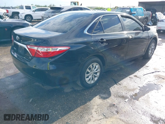 2016 Toyota Camry XLE with VIN 4T4BF1FK8GR563047, listed as a IAAI auction lot 41903643 with 151,560 mi miles and . Bid and sale history available at DreamBid. Image 4.