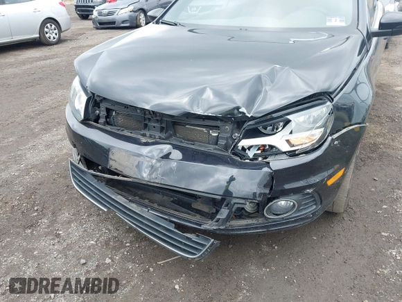 2014 Volkswagen Eos Sport with VIN WVWBW8AH2EV003356, listed as a IAAI auction lot 42394312 with 70,448 mi miles and . Bid and sale history available at DreamBid. Image 6.
