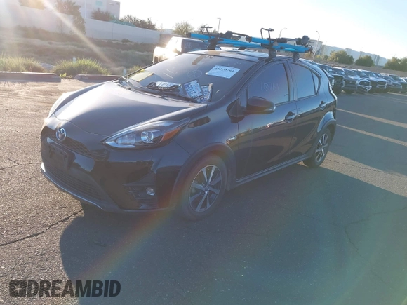 2018 Toyota Prius One with VIN JTDKDTB37J1605828, listed as a IAAI auction lot 41310761 with 85,079 mi miles and . Bid and sale history available at DreamBid. Image 2.