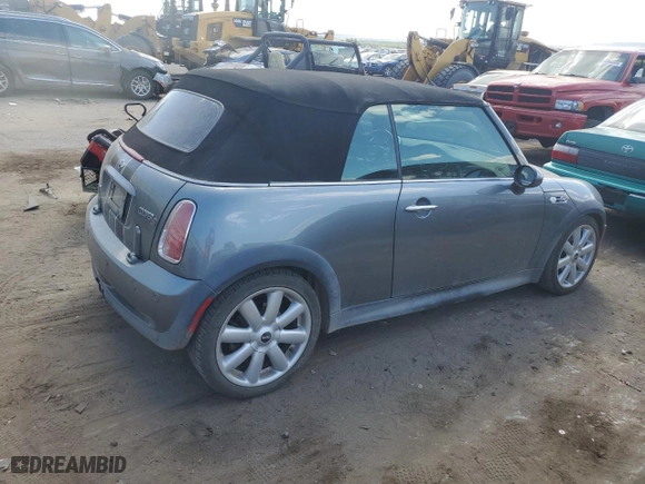 2007 MINI Cooper Convertible S with VIN WMWRH33507TL94503, listed as a Copart auction lot 71193594 with 103,784 mi miles and Salvage Title. Bid and sale history available at carsss.com. Image 3.