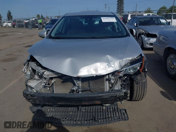 2019 Toyota Corolla L with VIN 2T1BURHE2KC190975, listed as a IAAI auction lot 41901370 with 94,925 mi miles. Bid and sale history available at carsss.com. Image 13.